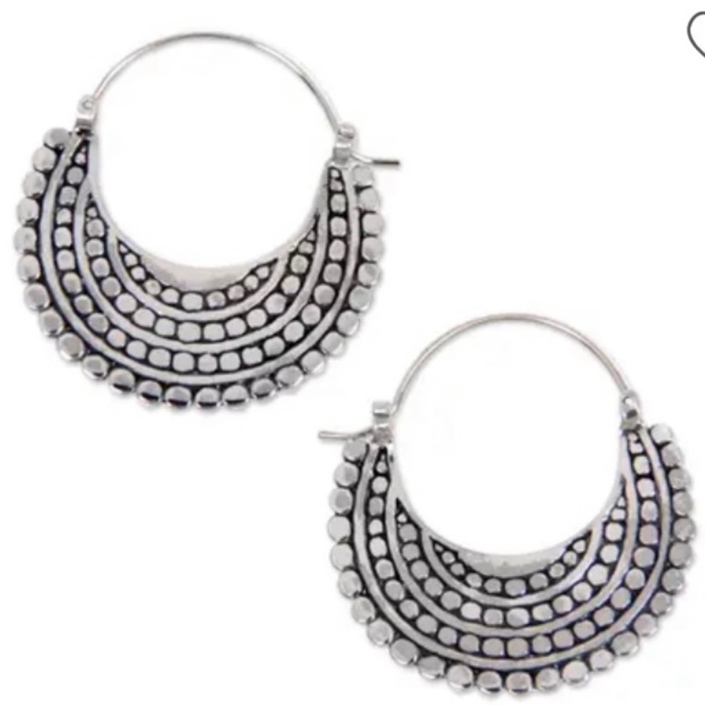 Sterling silver Balinese crescent shaped hoops.